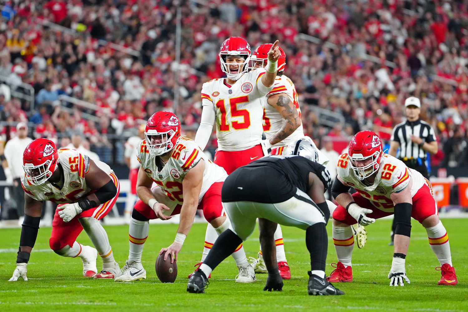 Nov 26, 2023; Paradise, Nevada, USA; Kansas City Chiefs quarterback Patrick Mahomes (15) calls a play against the Las Vegas Raiders during the fourth quarter at Allegiant Stadium. Mandatory Credit: Stephen R. Sylvanie-USA TODAY Sports  